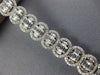ESTATE LARGE 5.99CT DIAMOND 18KT WHITE GOLD 3D INVISIBLE OVAL TENNIS BRACELET