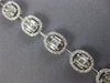 ESTATE 3.73CT DIAMOND 18KT WHITE GOLD 3D INVISIBLE OVAL CLASSIC TENNIS BRACELET