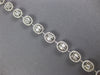 ESTATE 3.73CT DIAMOND 18KT WHITE GOLD 3D INVISIBLE OVAL CLASSIC TENNIS BRACELET