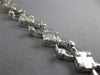 WIDE 2.75CT DIAMOND 18KT WHITE GOLD 3D SQUARE INVISIBLE ETOILE TENNIS BRACELET