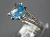 1.85CT DIAMOND & AAA BLUE TOPAZ 14KT WHITE GOLD 3D CUSHION & ROUND FUN RING