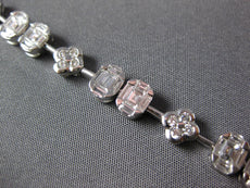 3.98CT DIAMOND 18KT WHITE GOLD INVISIBLE FLOWER OVAL BY THE YARD TENNIS BRACELET