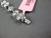 3.98CT DIAMOND 18KT WHITE GOLD INVISIBLE FLOWER OVAL BY THE YARD TENNIS BRACELET