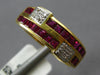 1.24CT DIAMOND & AAA RUBY 18KT YELLOW GOLD ROUND & PRINCESS CRISS CROSS FUN RING