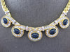 LARGE & LONG 16.0CT DIAMOND & AAA SAPPHIRE 18KT YELLOW GOLD LOVE KNOT NECKLACE