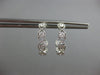 .69CT DIAMOND 18KT WHITE GOLD CLASSIC ETOILE INFINITY SEMI HOOP HANGING EARRINGS