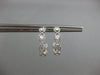 .69CT DIAMOND 18KT WHITE GOLD CLASSIC ETOILE INFINITY SEMI HOOP HANGING EARRINGS