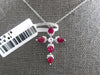 1CT DIAMOND & AAA RUBY 18KT WHITE GOLD ROUND & PEAR SHAPE CROSS FLOATING PENDANT