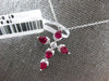1CT DIAMOND & AAA RUBY 18KT WHITE GOLD ROUND & PEAR SHAPE CROSS FLOATING PENDANT