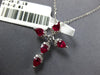 1CT DIAMOND & AAA RUBY 18KT WHITE GOLD ROUND & PEAR SHAPE CROSS FLOATING PENDANT