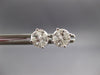 ESTATE .57CT DIAMOND 18KT WHITE GOLD 3D TRILLION INVISIBLE ROUND STUD EARRINGS