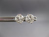 ESTATE .57CT DIAMOND 18KT WHITE GOLD 3D TRILLION INVISIBLE ROUND STUD EARRINGS