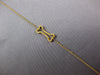 ESTATE .12CT FANCY YELLOW DIAMOND 18KT YELLOW GOLD 3D DOG BONE FUN BRACELET