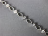 ESTATE .63CT DIAMOND 18K WHITE GOLD CLASSIC ETOILE OVAL & SQUARE TENNIS BRACELET