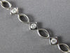 ESTATE .63CT DIAMOND 18K WHITE GOLD CLASSIC ETOILE OVAL & SQUARE TENNIS BRACELET