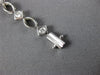 ESTATE .63CT DIAMOND 18K WHITE GOLD CLASSIC ETOILE OVAL & SQUARE TENNIS BRACELET