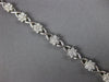 ESTATE 1.44CT DIAMOND 18K WHITE GOLD MULTI FLOWER X LOVE CLASSIC TENNIS BRACELET