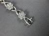 ESTATE 1.44CT DIAMOND 18K WHITE GOLD MULTI FLOWER X LOVE CLASSIC TENNIS BRACELET