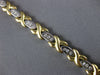ESTATE WIDE .58CT DIAMOND 14KT 2 TONE GOLD 3 STONE ETOILE X LOVE TENNIS BRACELET