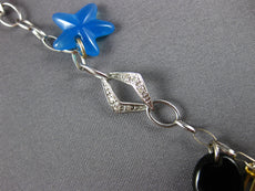 ESTATE .16CT DIAMOND AAA BLUE AGATE & ONYX 18KT 2 TONE GOLD STAR TOGGLE BRACELET