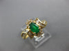 .68CT DIAMOND & AAA EMERALD 14KT YELLOW GOLD OVAL & ROUND FLOWER SWIRL FUN RING