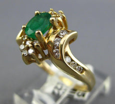 .68CT DIAMOND & AAA EMERALD 14KT YELLOW GOLD OVAL & ROUND FLOWER SWIRL FUN RING