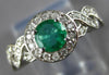 ESTATE .70CT DIAMOND & AAA EMERALD 14KT WHITE GOLD ROUND HALO INFINITY LOVE RING