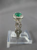 ESTATE .70CT DIAMOND & AAA EMERALD 14KT WHITE GOLD ROUND HALO INFINITY LOVE RING