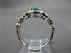 ESTATE .70CT DIAMOND & AAA EMERALD 14KT WHITE GOLD ROUND HALO INFINITY LOVE RING