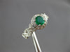 ESTATE .70CT DIAMOND & AAA EMERALD 14KT WHITE GOLD ROUND HALO INFINITY LOVE RING