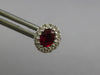 1CT DIAMOND & AAA RUBY 18KT WHITE GOLD OVAL & ROUND FLOWER CLASSIC STUD EARRINGS