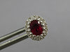 1CT DIAMOND & AAA RUBY 18KT WHITE GOLD OVAL & ROUND FLOWER CLASSIC STUD EARRINGS