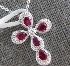 1.17CT DIAMOND & RUBY 18KT WHITE GOLD ROUND & PEAR SHAPE CROSS FLOATING PENDANT