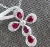 1.17CT DIAMOND & RUBY 18KT WHITE GOLD ROUND & PEAR SHAPE CROSS FLOATING PENDANT
