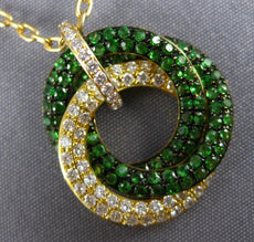 1.81CT DIAMOND & AAA TSAVORITE 18KT YELLOW GOLD 3D INTERTWINING CIRCULAR PENDANT