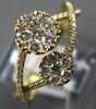 ESTATE .51CT DIAMOND 18KT YELLOW GOLD 3D DOUBLE FLOWER INFINITY LOVE KNOT RING