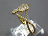 ESTATE .51CT DIAMOND 18KT YELLOW GOLD 3D DOUBLE FLOWER INFINITY LOVE KNOT RING