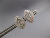 .94CT DIAMOND 18KT WHITE GOLD ROUND & BAGUETTE INVISIBLE MARQUISE STUD EARRINGS