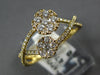 ESTATE .51CT DIAMOND 18KT YELLOW GOLD 3D DOUBLE FLOWER INFINITY LOVE KNOT RING