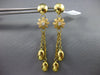 LARGE .05CT DIAMOND 18KT YELLOW GOLD 3D MATTE AND SHINY FLOWER HANGING EARRINGS