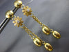 LARGE .05CT DIAMOND 18KT YELLOW GOLD 3D MATTE AND SHINY FLOWER HANGING EARRINGS