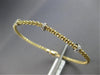 0.06CT DIAMOND 14KT 2 TONE GOLD PAST PRESENT FUTURE FLEXIBLE MESH BANGLE BRACELET