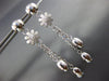 ESTATE LARGE .05CT DIAMOND 18KT WHITE GOLD MATTE & SHINY FLOWER HANGING EARRINGS