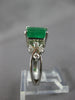 1.44CT DIAMOND & AAA EMERALD 14KT WHITE GOLD 3D FLOWER INFINITY ENGAGEMENT RING