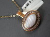LARGE .89CT DIAMOND & AAA MOTHER OF PEARL 18KT ROSE GOLD SIDEWAYS OVAL PENDANT
