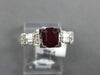 1.61CT DIAMOND & AAA RUBY 18KT WHITE GOLD 3D EMERALD CUT & ROUND ENGAGEMENT RING