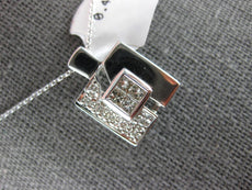 .40CT DIAMOND 18KT WHITE GOLD ROUND & PRINCESS INVISIBLE SQUARE FLOATING PENDANT