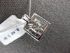 .40CT DIAMOND 18KT WHITE GOLD ROUND & PRINCESS INVISIBLE SQUARE FLOATING PENDANT