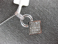 .81CT DIAMOND 14KT WHITE GOLD ROUND & PRINCESS INVISIBLE SQUARE FLOATING PENDANT