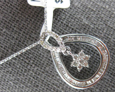 .52CT DIAMOND 18KT WHITE GOLD ROUND & BAGUETTE FLOWER TEAR DROP FLOATING PENDANT